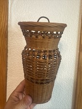 vintage two-toned woven wicker wall pocket basket picture
