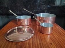 Lot of three small Vintage copper sauce pans. picture