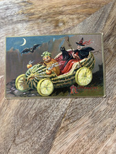 ANTIQUE  TUCK'S BLACK CAT AND WITCH IN WATERMELON CAR HALLOWEEN POSTCARD picture