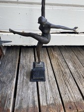 Art Deco bronze sculpture,  female dancer dynamic arabesque pose. picture