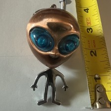 Vintage Blue Eyed Alien Lighter picture