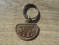VINTAGE RALEIGH LIGHTS RODEO KEYCHAIN -NEW picture