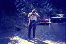 1971 35mm slide Man Photographer with Large Camera Tripod Woods #2011 picture