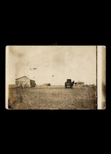 UFO’s over Farm on Sparse Landscape, real-photo postcard 1908 Unusual Strange picture