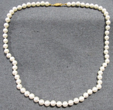 Vintage flower goldtone metal clasp hand knotted in between faux pearls necklace picture