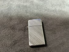 Zippo Slim Lighter 1984 Bright Cut Diagonal Lines High Polished Chrome picture