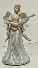 Porcelain angel 9'' Tall Angel music box Playing Bandoleer Glory to all Song picture
