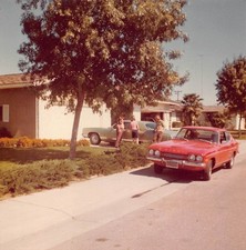 Red Ford Capri 1970s Photo California Plates Green Sedan Driveway House Street picture