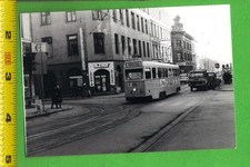 Vintage Snapshot Photo – Oslo Norway Tram on Urban Street with Shops (1980s) picture