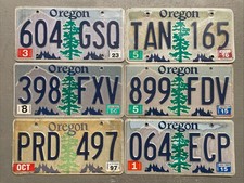 ONE OREGON LICENSE PLATE PINE TREE MOUNTAINS RANDOM LETTERS/NUMBERS CRAFT GRADE picture