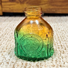 Green & Amber Glass Mini Bottle, Embossed Front Seal Design, Approx. 4 in Tall picture