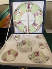 Nantucket Home Miniature Tea Set.  Brand new in box.  Slight discoloration on bo picture