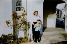 Young boy w/ mother; stucco house;  captain's cap; Pasadena, CA;35mm  kodachrome picture