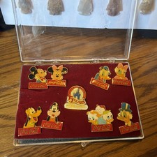 15 Years Walt Disney World Anniversary Coca Cola 9 Pin set In Case. Classic picture