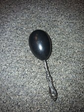 Victorian sock darning egg, ebony wood body and sterling silver handle. picture