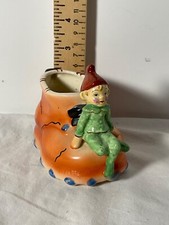 Ceramic shoe planter Elf sitting on front Japan picture