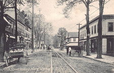 c.1907 Stores Main St. looking North Warren RI post card picture