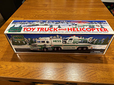 Rare- 1995 Chrome Hess Truck.   Original box and packaging with green felt base picture