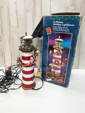 Vintage 1996 A Mickey Holiday mechanical lighthouse spinning light animation picture