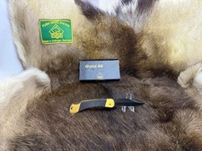 1988 Puma Gold 88 Knife With  Black Checkered Handles Mint In Factory Box picture