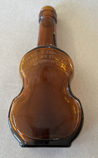 VINTAGE BARD'S TOWN  WHISKEY  AMBER VIOLIN SHAPED BOTTLE (EMPTY) picture