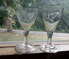 1790s EARLY FREE BLOWN PONTILED WINE GLASS PAIR WITH MATCHING ENGRAVED LEAVES picture