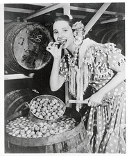 Pretty Maria Luz lends authentic Spanish beauty an opened cask of - Old Photo picture
