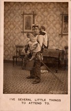 SEVERAL LITTLE THINGS Man With Children Climbing Him HUMOR rppc c1912 Postcard picture
