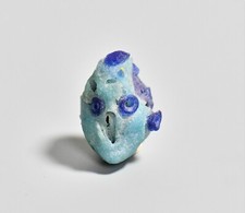 RARE ITEMS A Phoenician Glass Head Pendant picture