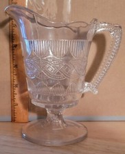 Vintage CLEAR PRESSED GLASS SMALL FOOTED PITCHER picture