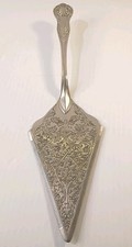 Older Kitchen Wear Cake Server, Color Silver Tone  Pre-owned 11.5 Inch Long picture